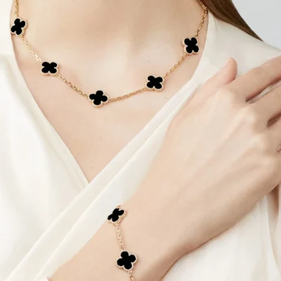 Clover Motif Statement Necklace – 10-Link 18K Yellow Gold-Plated Chain with Black Onyx Pendants - Front View